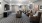 a clubroom movie theater with a tv and chairs